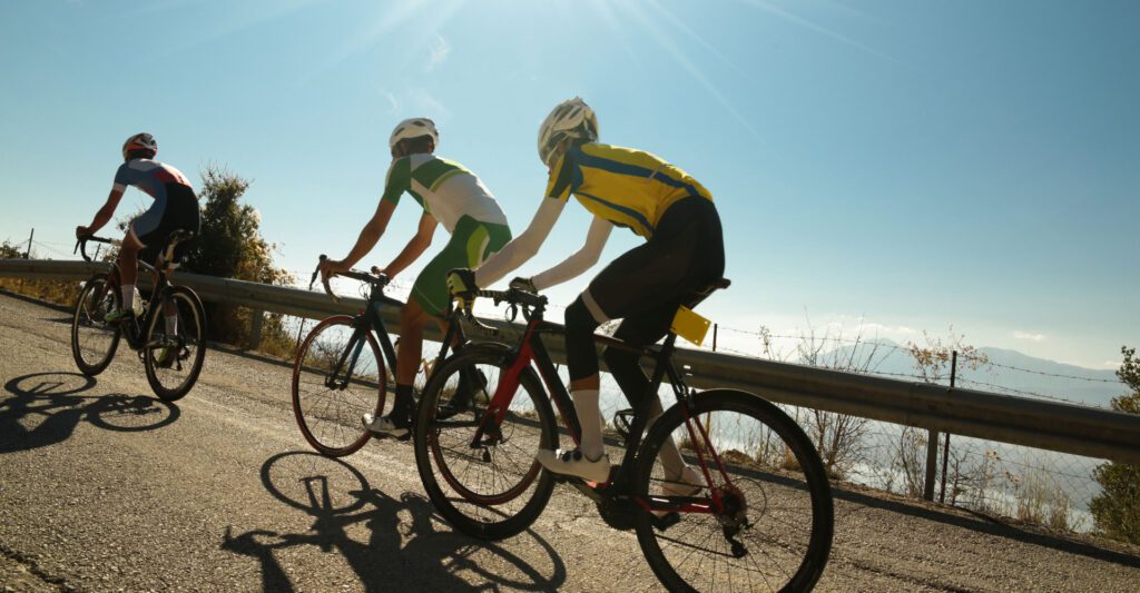 Image of cyclists biking uphill to demonstrate the potential uphill battle with limited prospects in some sales territories