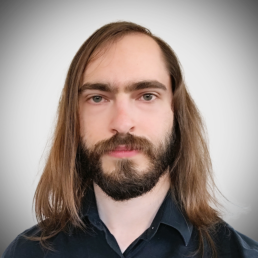 Ryan Milem, Core Commissions software architect, is pictured against a gray background.